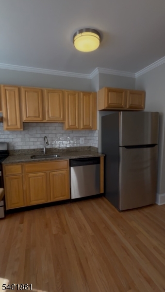665 Ridgewood Road, Unit 8 Millburn, NJ 07041 - Photo 3 of 10 a kitchen with a refrigerator and a sink