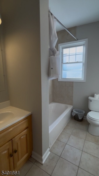 665 Ridgewood Road, Unit 8 Millburn, NJ 07041 - Photo 4 of 10 a bathroom with a sink a toilet and bathtub