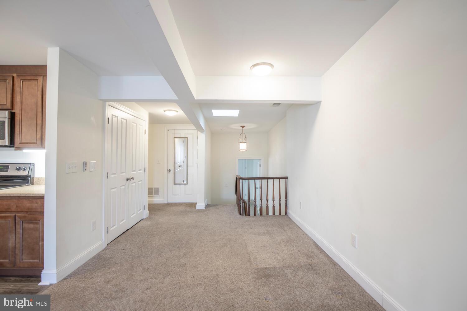30 West State Street, Unit B Doylestown, PA 18901 - Photo 18 of 27 a view of a hallway with white walls