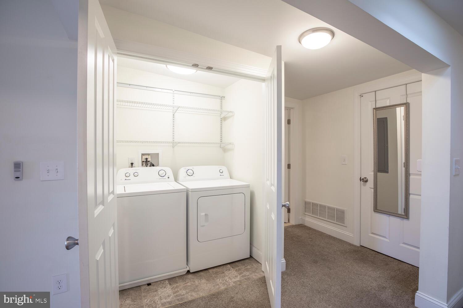 30 West State Street, Unit B Doylestown, PA 18901 - Photo 19 of 27 a view of utility room with washer and dryer