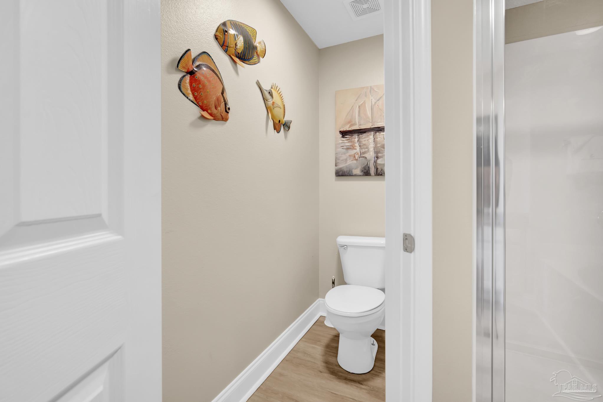 13661 Perdido Key Drive, Unit 1603 Perdido Key, FL 32507 - Photo 29 of 50 a bathroom with a toilet and a shower