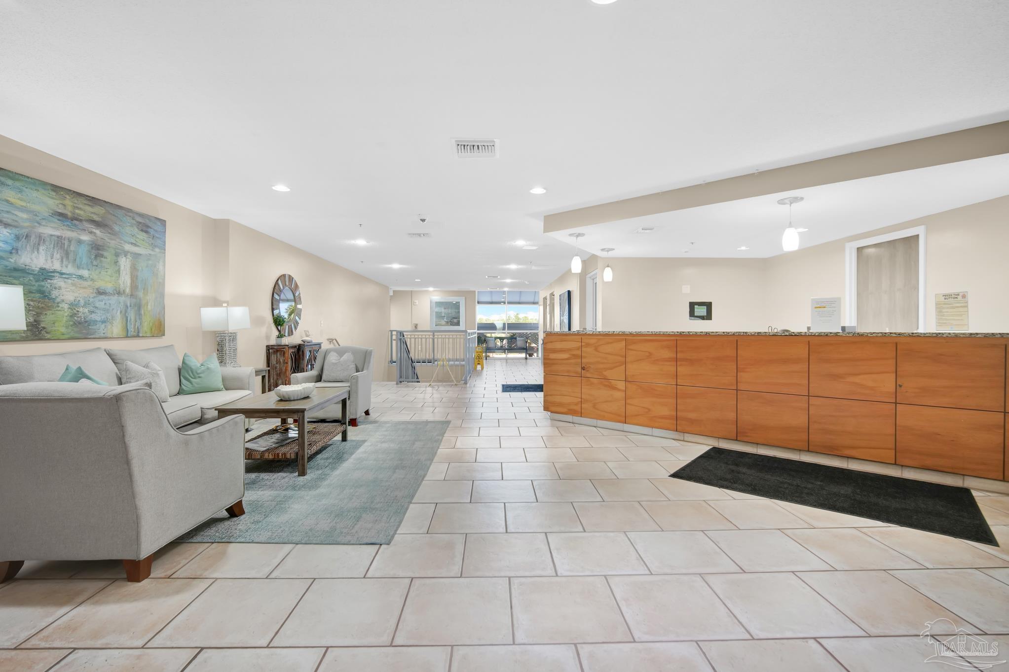 13661 Perdido Key Drive, Unit 1603 Perdido Key, FL 32507 - Photo 39 of 50 a living room with couches and kitchen view