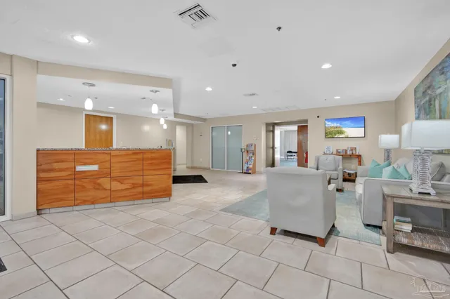 a view of ocean with a multi story building