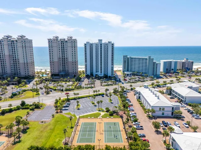 a view of a swimming pool with a patio