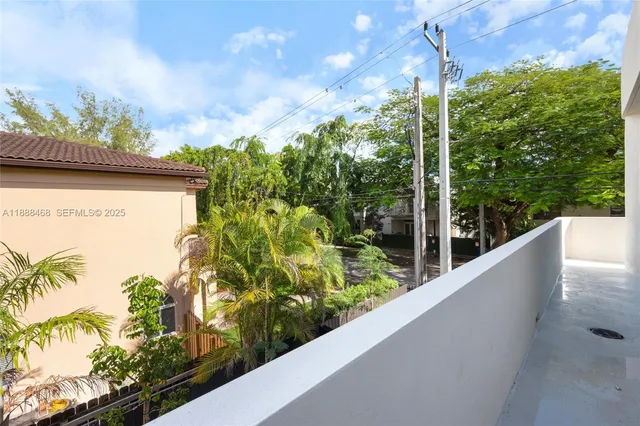 a view of a balcony with an outdoor space