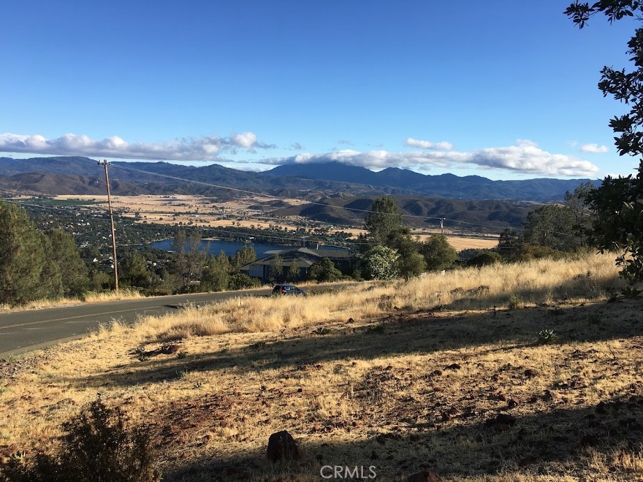 15927 Eagle Rock Road Hidden Valley Lake, CA 95467 - Photo 19 of 65 a view of a lake with a mountain