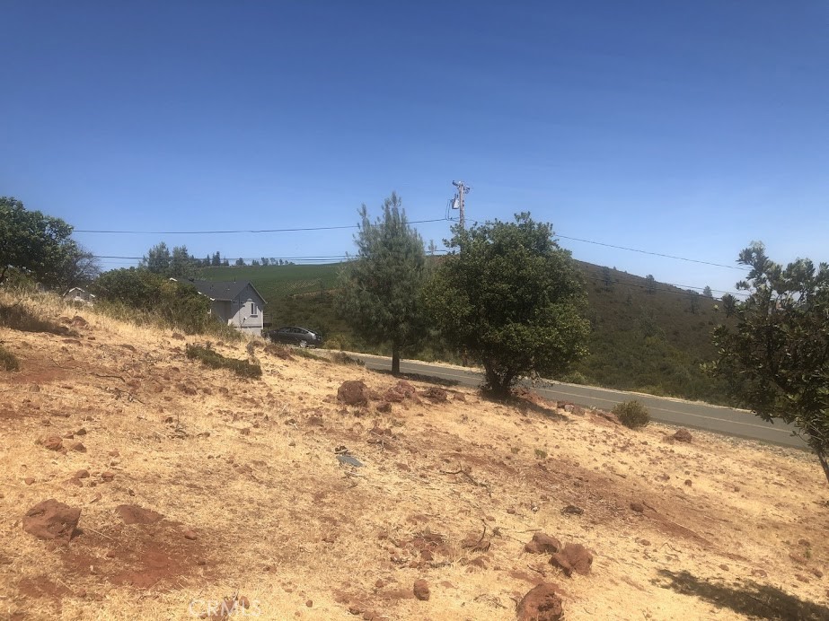 15927 Eagle Rock Road Hidden Valley Lake, CA 95467 - Photo 21 of 65 a view of a yard covered with snow