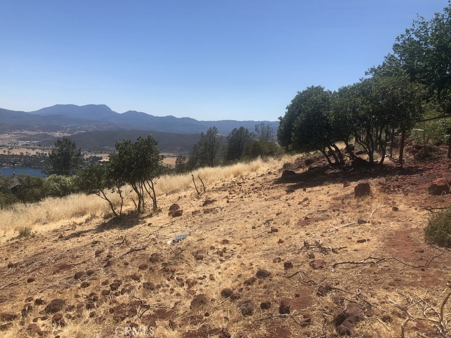 15927 Eagle Rock Road Hidden Valley Lake, CA 95467 - Photo 32 of 65 a view of a lake with a mountain in the background