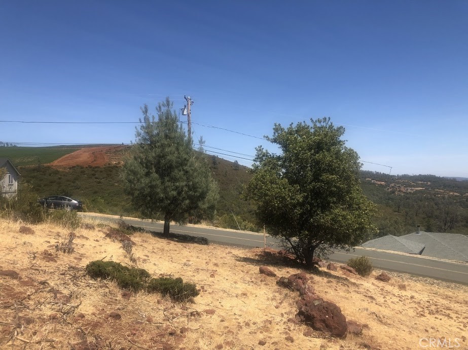 15927 Eagle Rock Road Hidden Valley Lake, CA 95467 - Photo 33 of 65 a view of a yard covered with snow