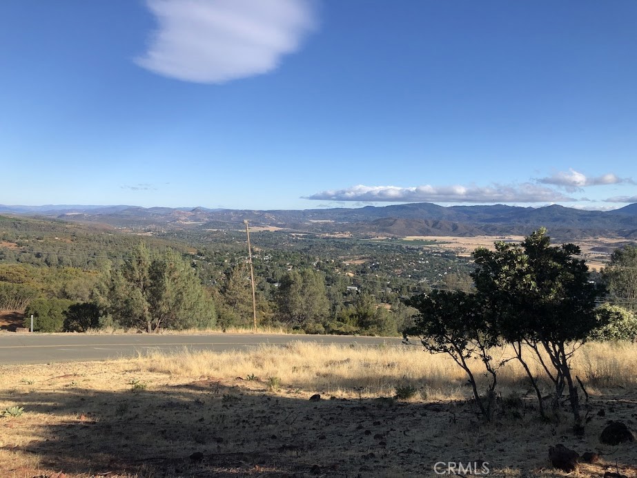 15927 Eagle Rock Road Hidden Valley Lake, CA 95467 - Photo 44 of 65 a view of a lake with mountains in the background