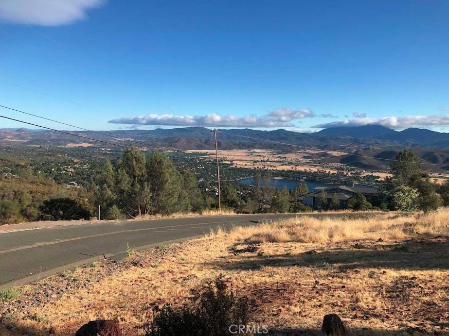 15927 Eagle Rock Road Hidden Valley Lake, CA 95467 - Photo 48 of 65 a view of a lake with mountains in the background