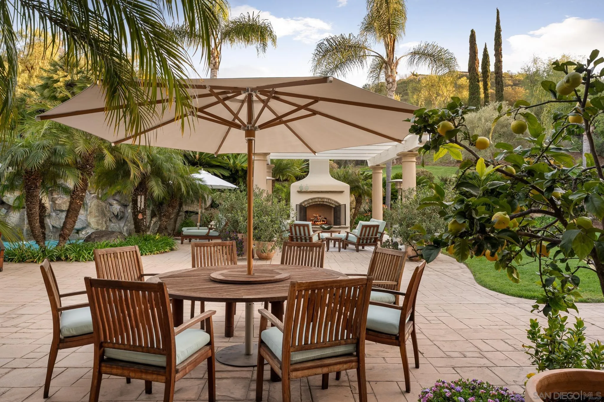 6369 Clubhouse Rancho Santa Fe, CA 92067 - Photo 12 of 43 a view of an outdoor space with a table and chairs