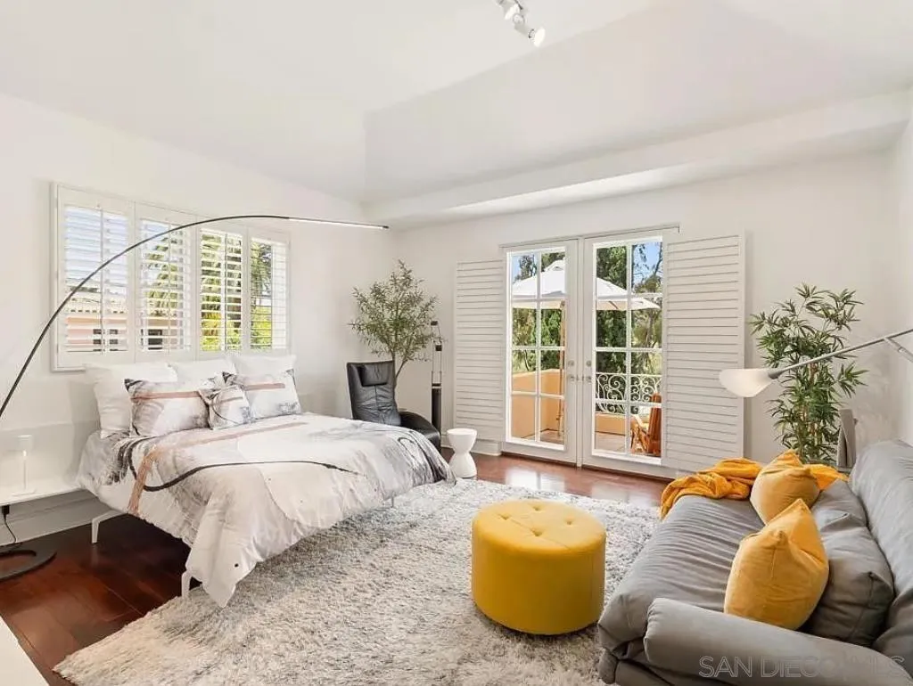 6369 Clubhouse Rancho Santa Fe, CA 92067 - Photo 14 of 25 a spacious bedroom with bed and a large window