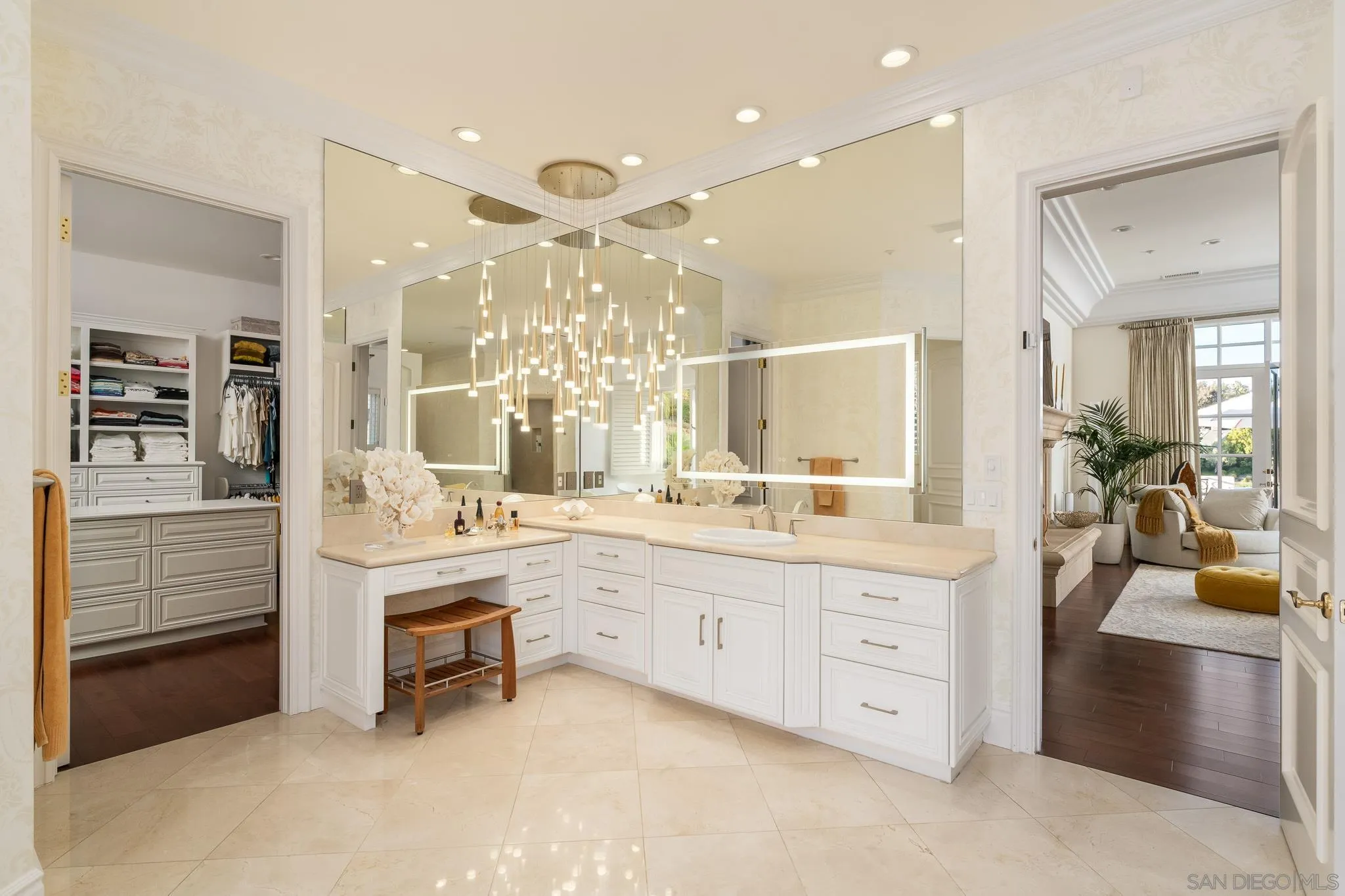 6369 Clubhouse Rancho Santa Fe, CA 92067 - Photo 16 of 43 a large bathroom with a double vanity sink a mirror and a shower