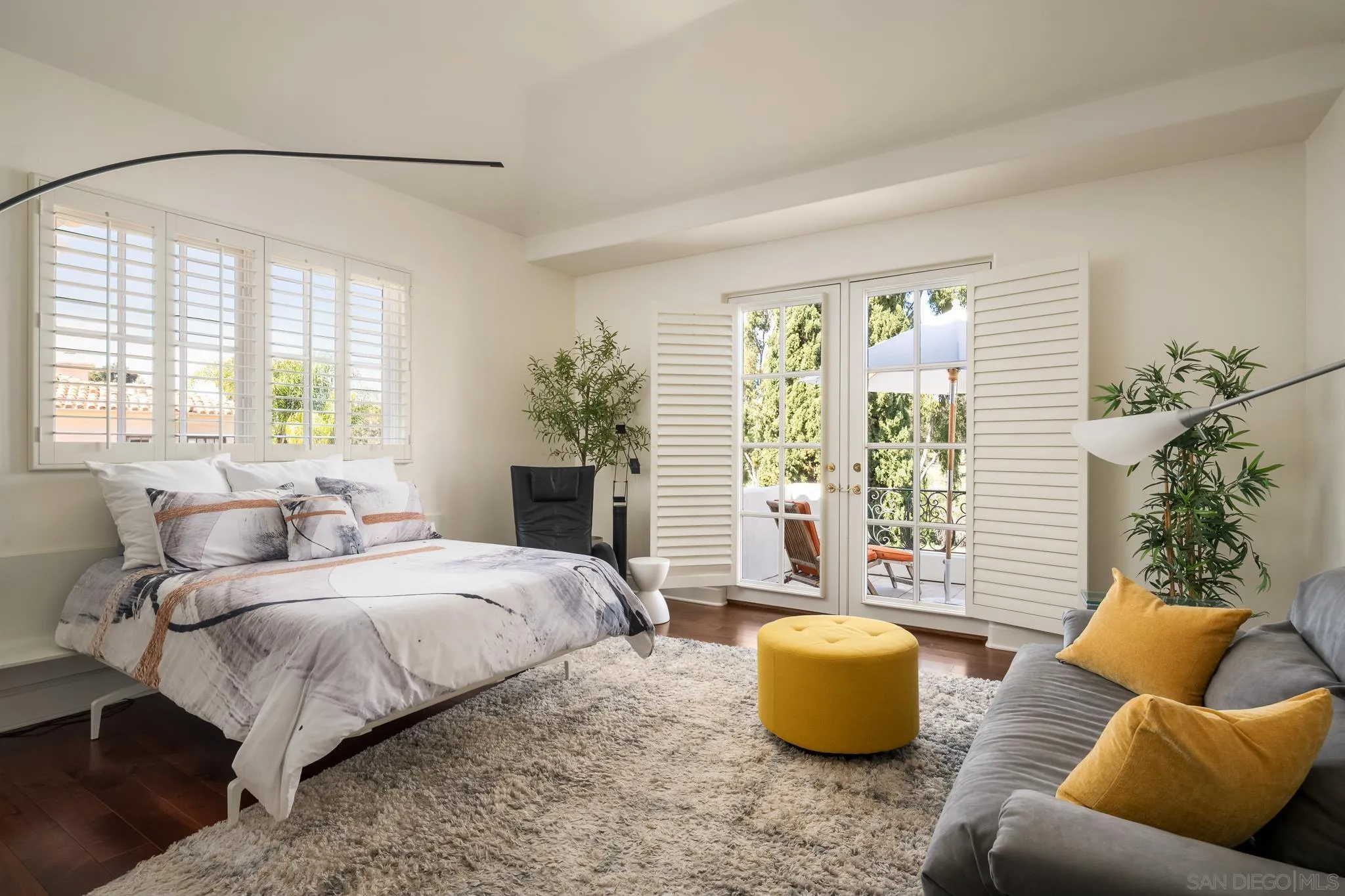 6369 Clubhouse Rancho Santa Fe, CA 92067 - Photo 22 of 43 a bedroom with a bed and a couch