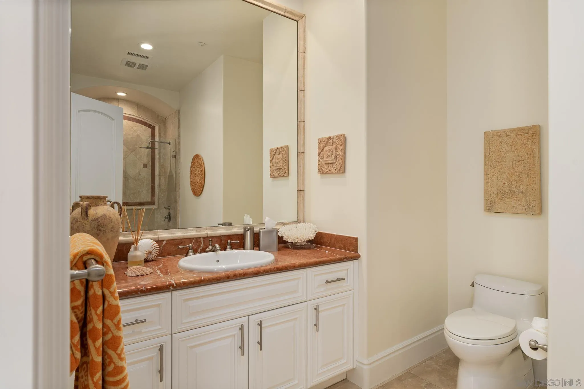 6369 Clubhouse Rancho Santa Fe, CA 92067 - Photo 29 of 43 a bathroom with a granite countertop sink mirror and toilet