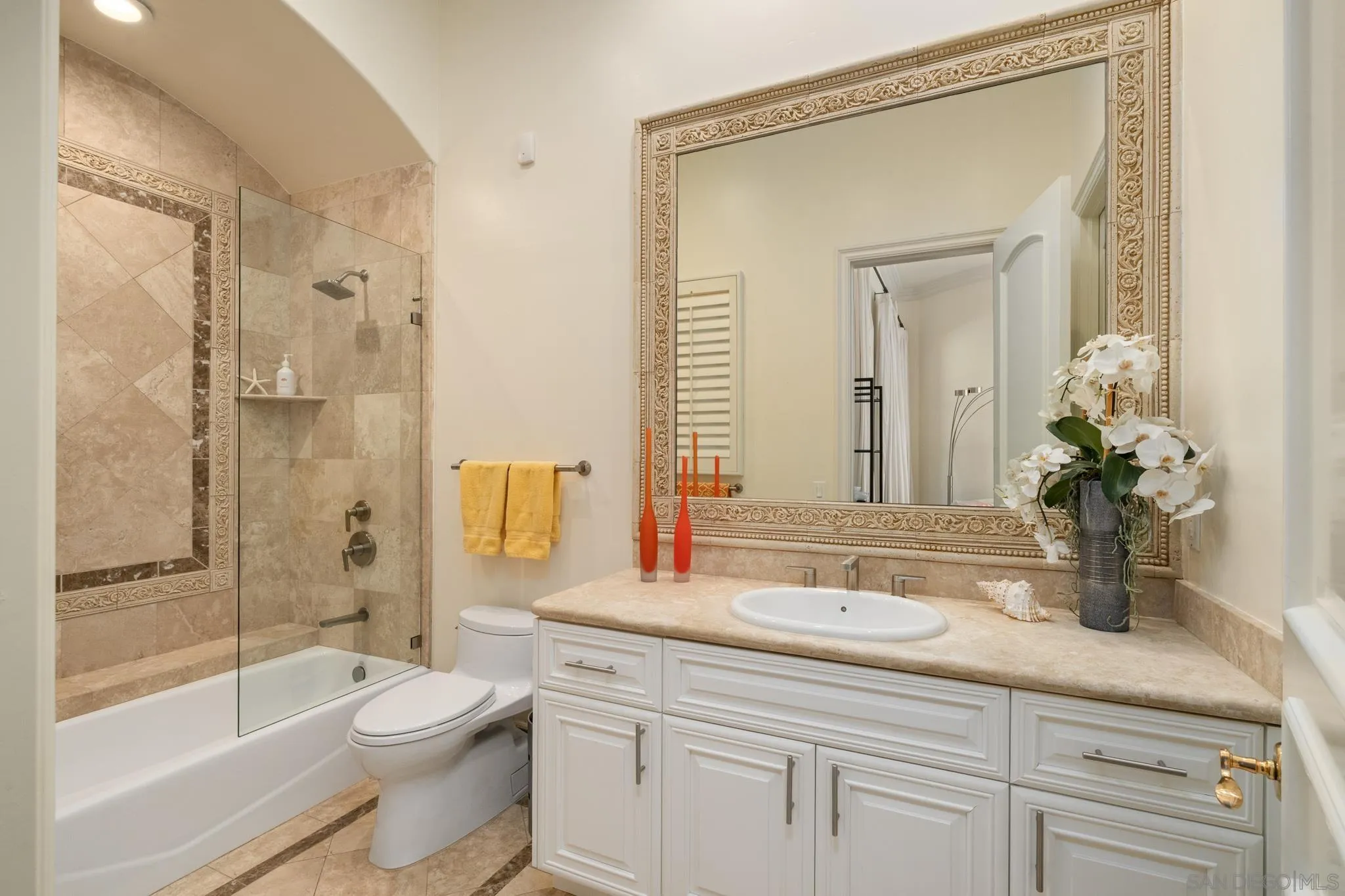 6369 Clubhouse Rancho Santa Fe, CA 92067 - Photo 31 of 43 a bathroom with a granite countertop sink a toilet and shower