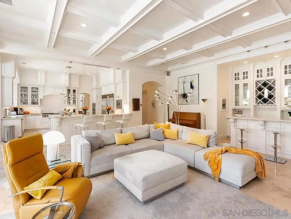 6369 Clubhouse Rancho Santa Fe, CA 92067 - Photo 5 of 25 a living room with furniture and a large mirror with wooden floor