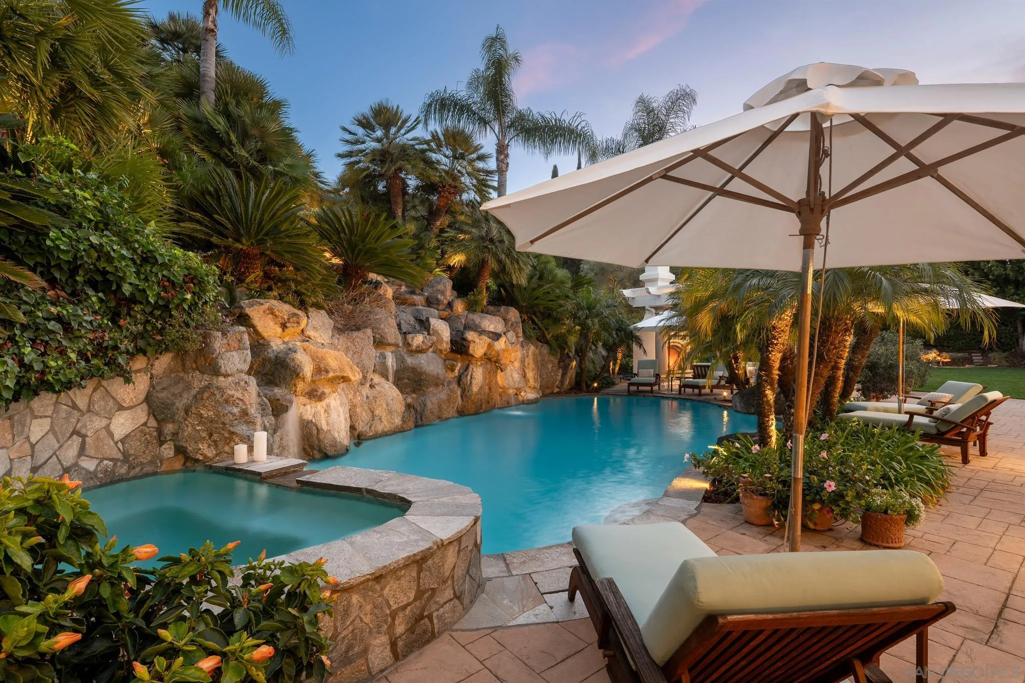 6369 Clubhouse Rancho Santa Fe, CA 92067 - Photo 5 of 43 a view of a swimming pool with a patio