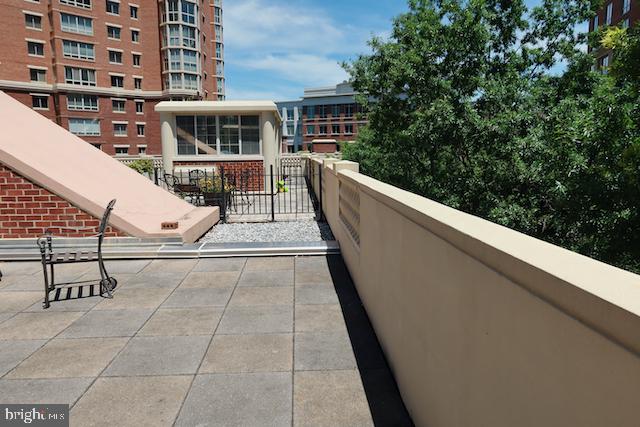 2151 Jamieson Avenue, Unit 411 Alexandria, VA 22314 - Photo 15 of 32 a view of a balcony with chairs
