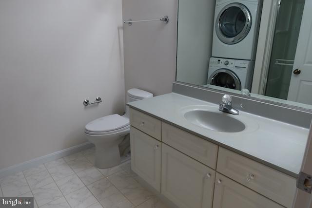 2151 Jamieson Avenue, Unit 411 Alexandria, VA 22314 - Photo 16 of 32 a bathroom with a sink a washer and dryer