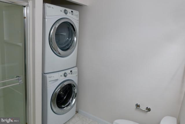 2151 Jamieson Avenue, Unit 411 Alexandria, VA 22314 - Photo 18 of 32 a utility room with dryer and washer