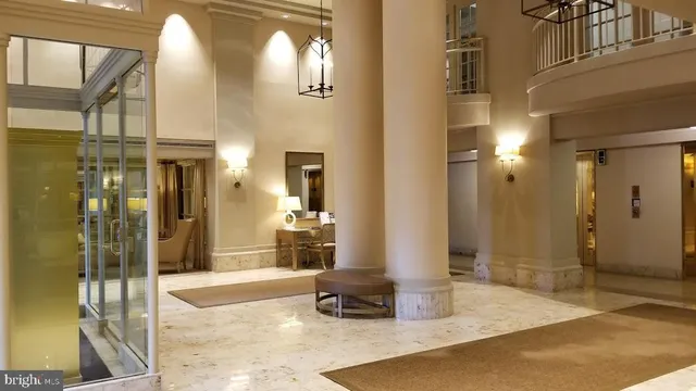 a view of a swimming pool with a lounge chairs