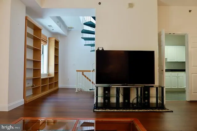 a view of entryway with wooden floor