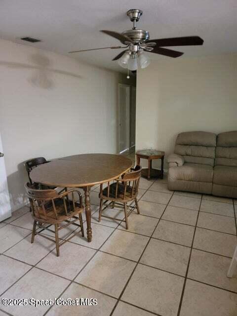 200 Southgate Boulevard Melbourne, FL 32901 - Photo 9 of 9 a view of a dining room with furniture