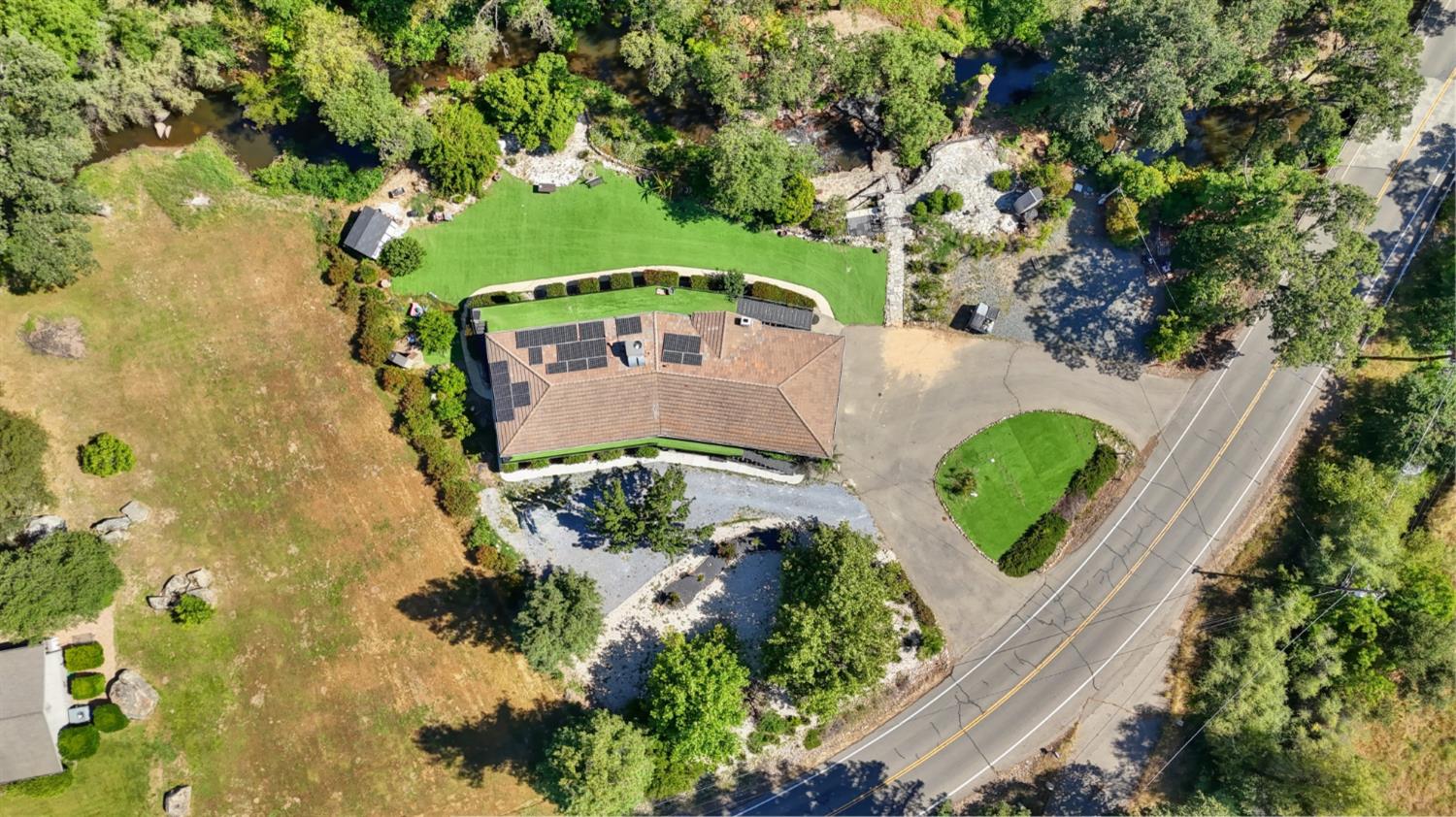 4330 Cavitt Stallman Road Granite Bay, CA 95746 - Photo 80 of 85 an aerial view of a house with a yard
