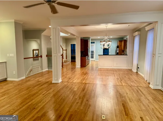 a kitchen with stainless steel appliances granite countertop a stove and a microwave