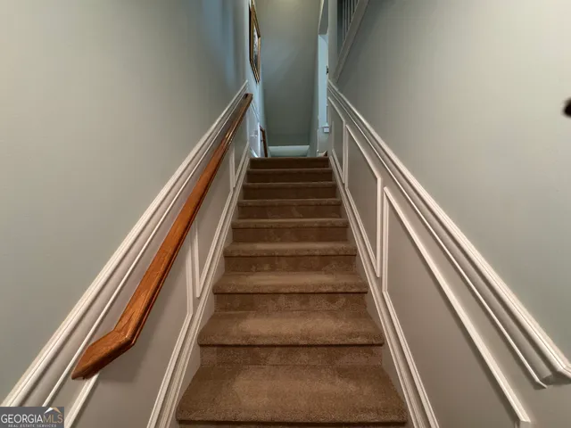 a kitchen with granite countertop a stove top oven