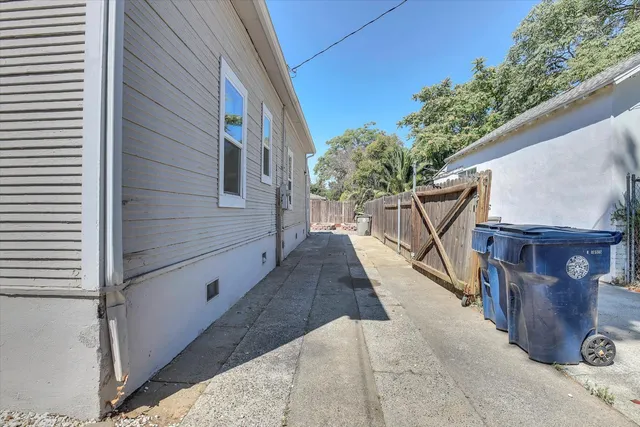 a view of a pathway with a backyard