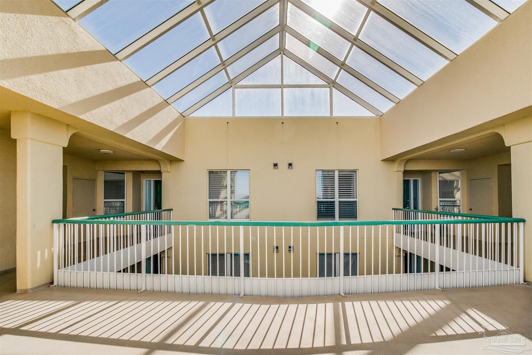 13601 Perdido Key Drive, Unit W18C Perdido Key, FL 32507 - Photo 11 of 30 a view of a wooden deck and a yard