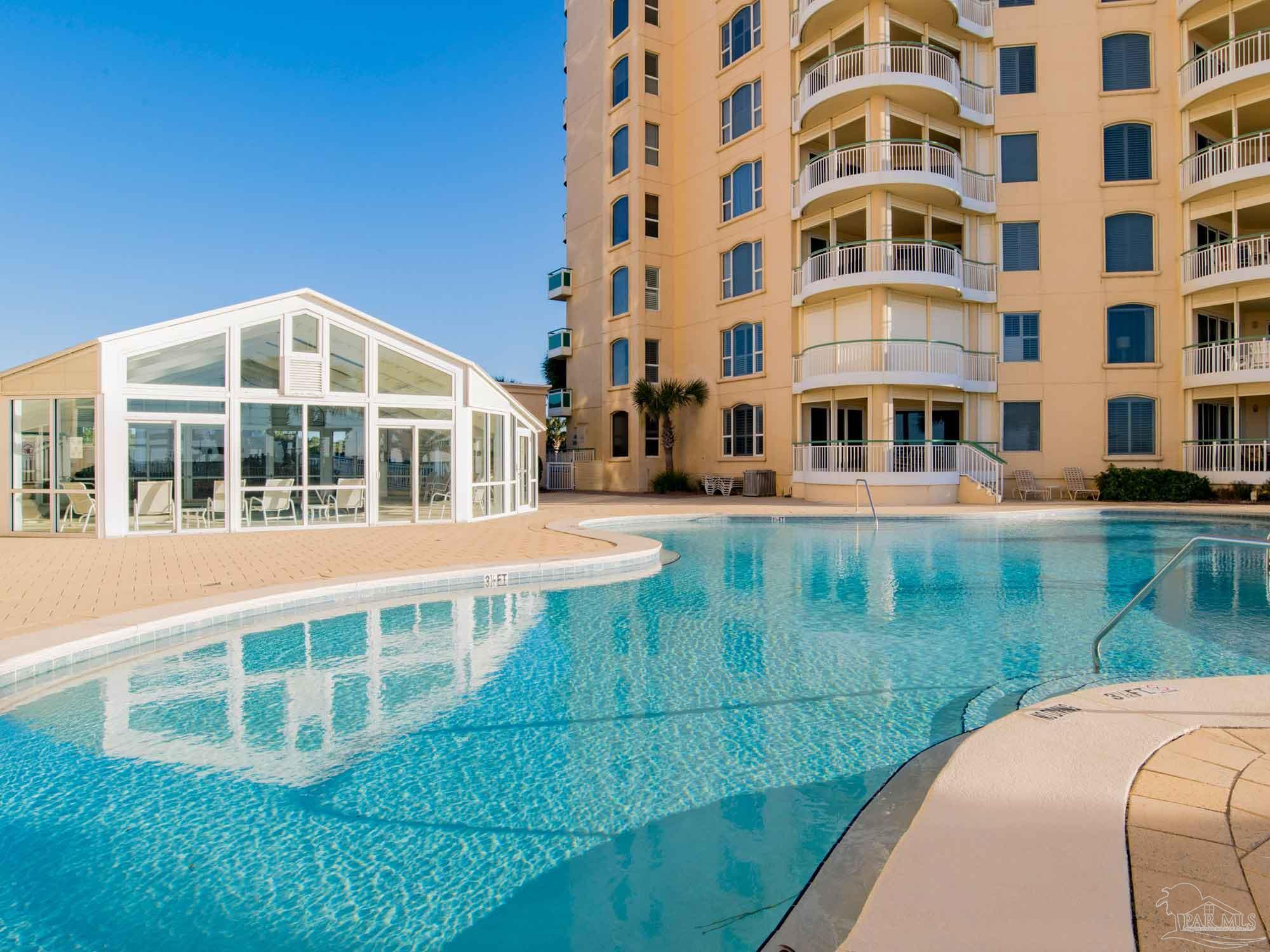 13601 Perdido Key Drive, Unit W18C Perdido Key, FL 32507 - Photo 24 of 30 a view of a building with a yard