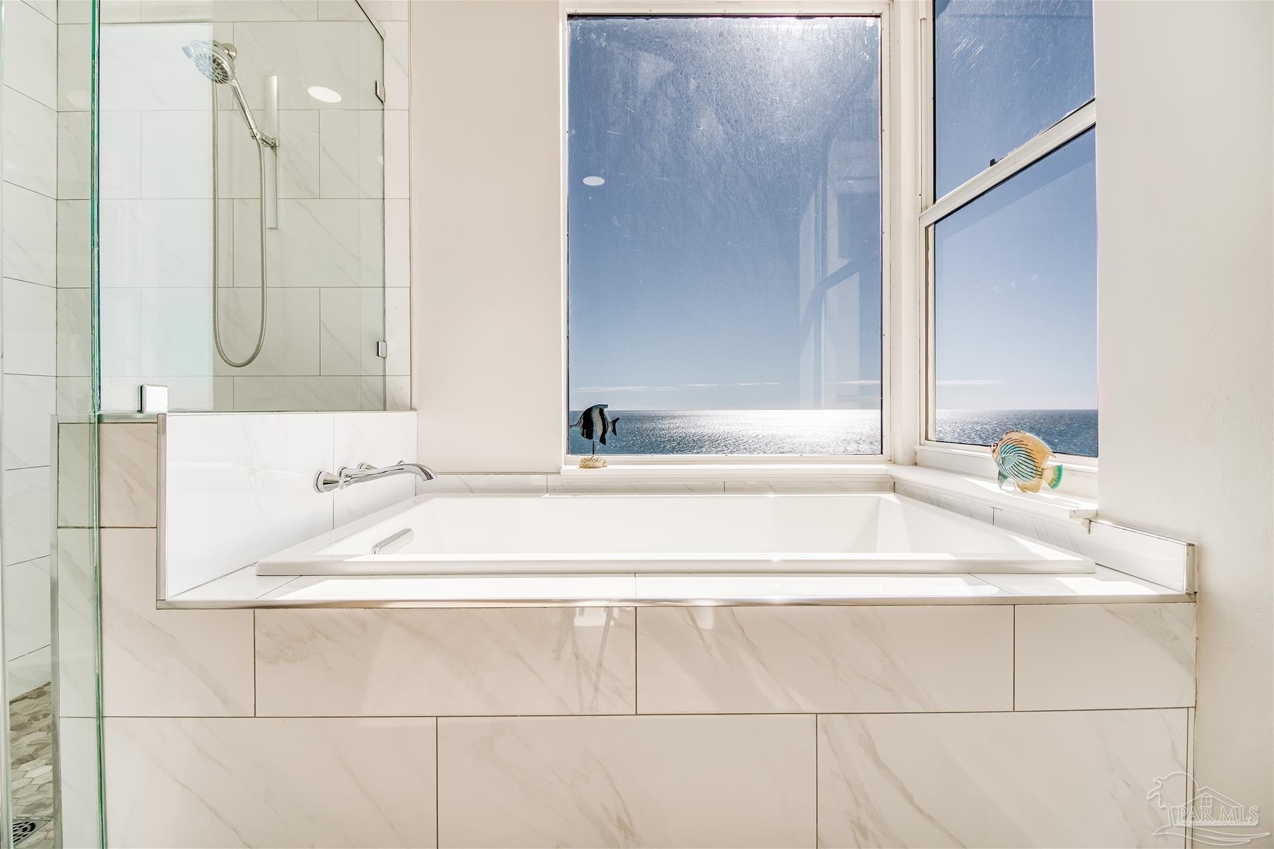 13601 Perdido Key Drive, Unit W18C Perdido Key, FL 32507 - Photo 7 of 30 a bathroom with a bathtub and a sink