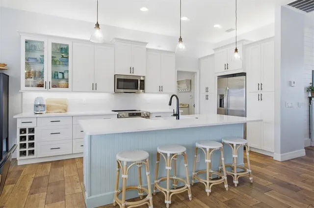 a bedroom with a bed and a mirror