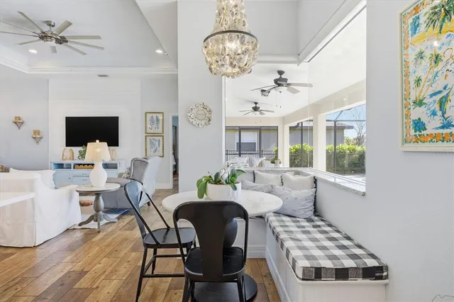 a bedroom with furniture and a book shelf