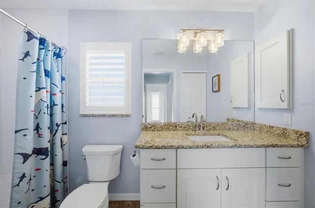 a view of a swimming pool with a lounge chairs