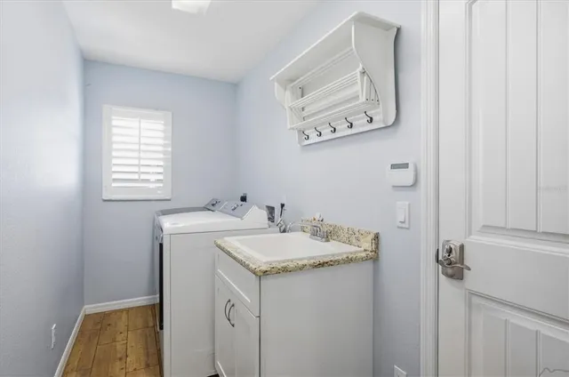 a view of a swimming pool with a patio