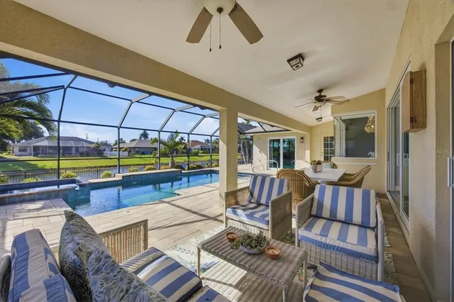 a view of swimming pool with a patio