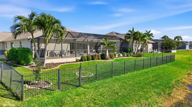 a view of a lake with a yard