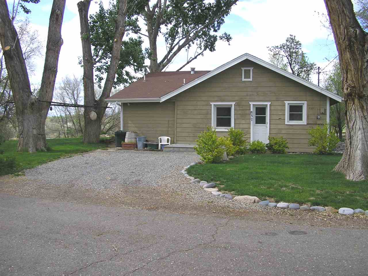 837 26 Road Grand Junction, CO 81505 - Photo 1 of 38 a view of a house with yard and plants