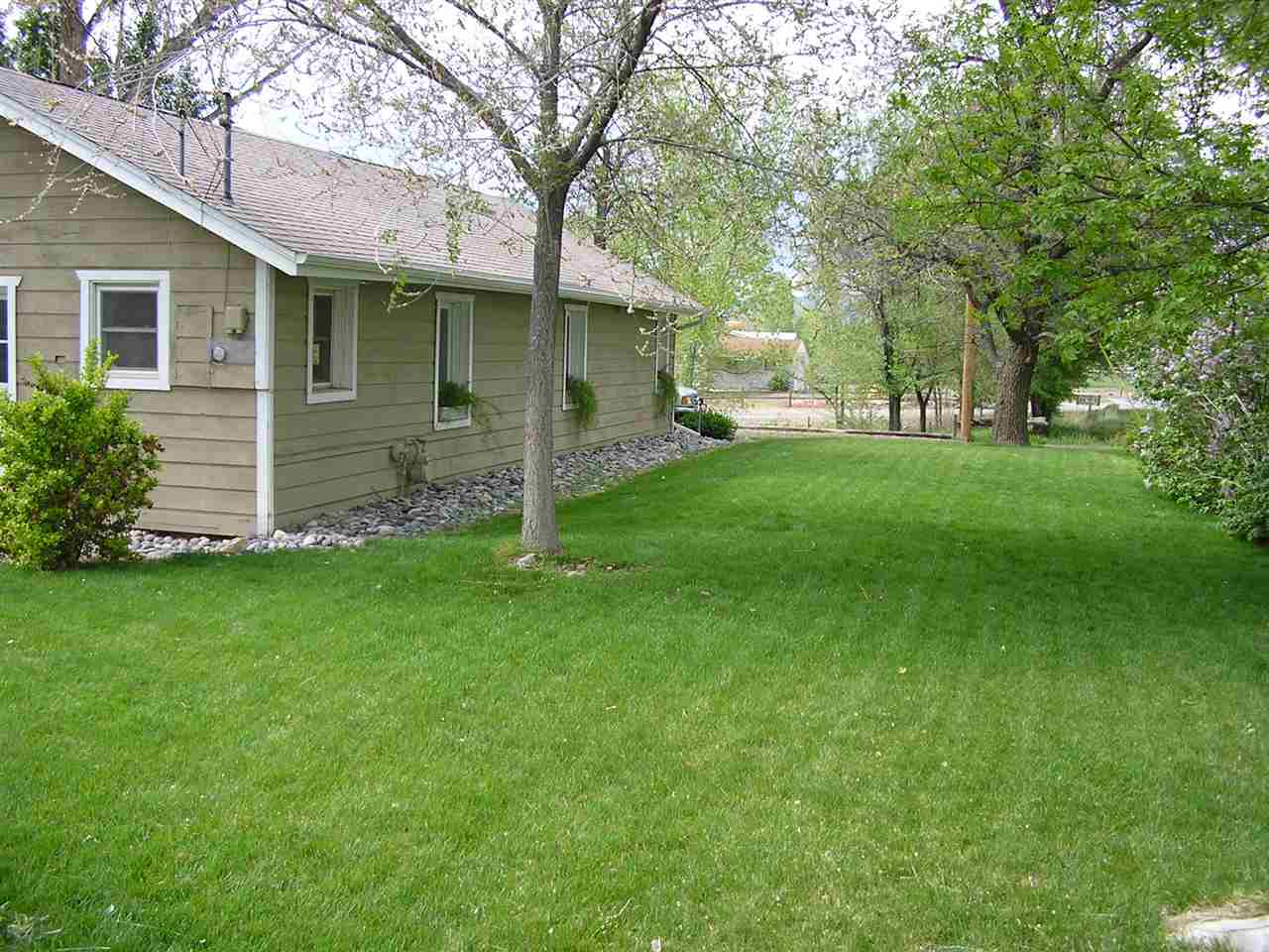 837 26 Road Grand Junction, CO 81505 - Photo 17 of 38 a view of a house with a yard