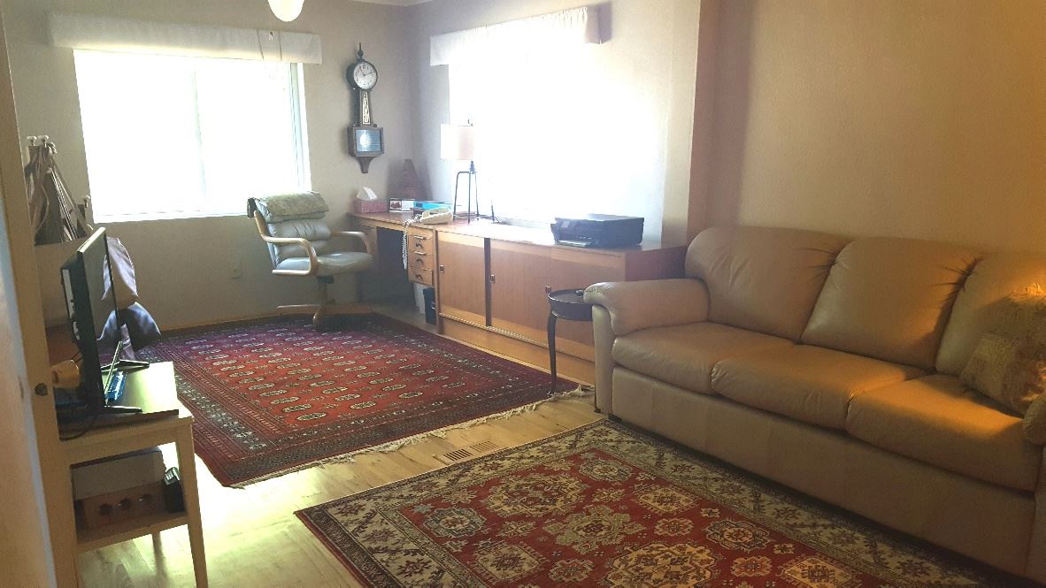 837 26 Road Grand Junction, CO 81505 - Photo 5 of 38 a living room with furniture rug and window