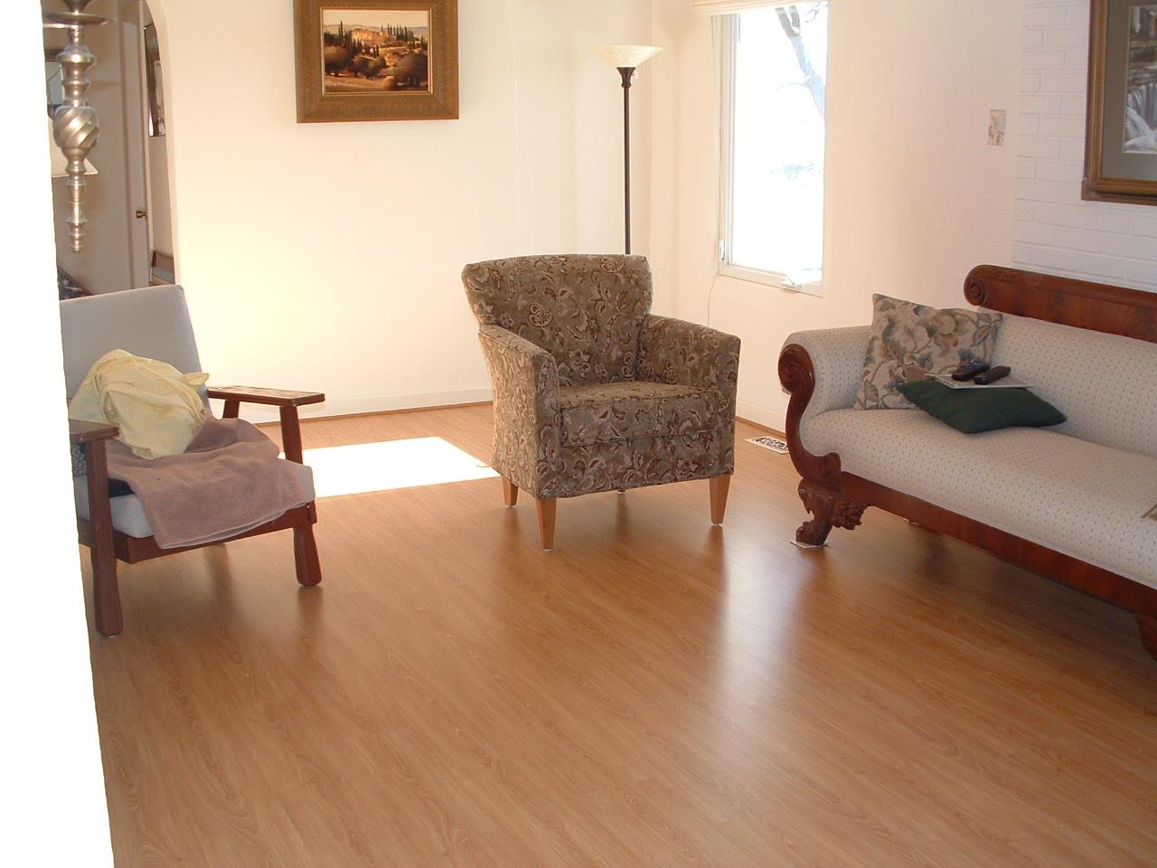 837 26 Road Grand Junction, CO 81505 - Photo 8 of 38 a living room with furniture and a large window