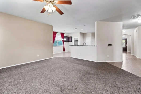 a view of a kitchen with a sink and cabinet area