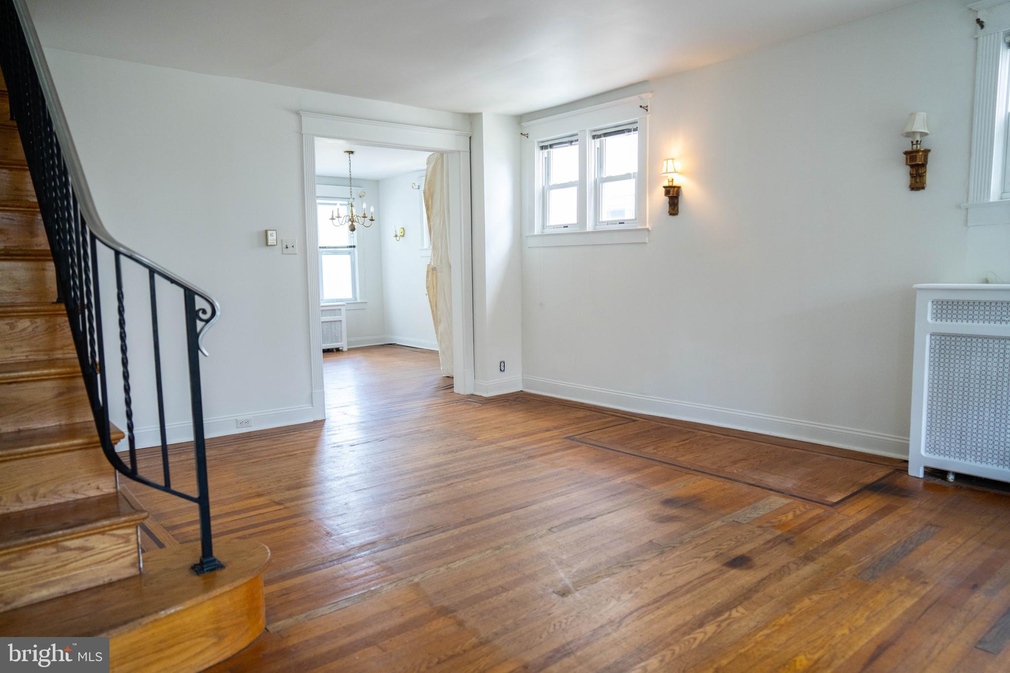 8 Oakley Road Upper Darby, PA 19082 - Photo 6 of 25 Living room looking into the dinning room