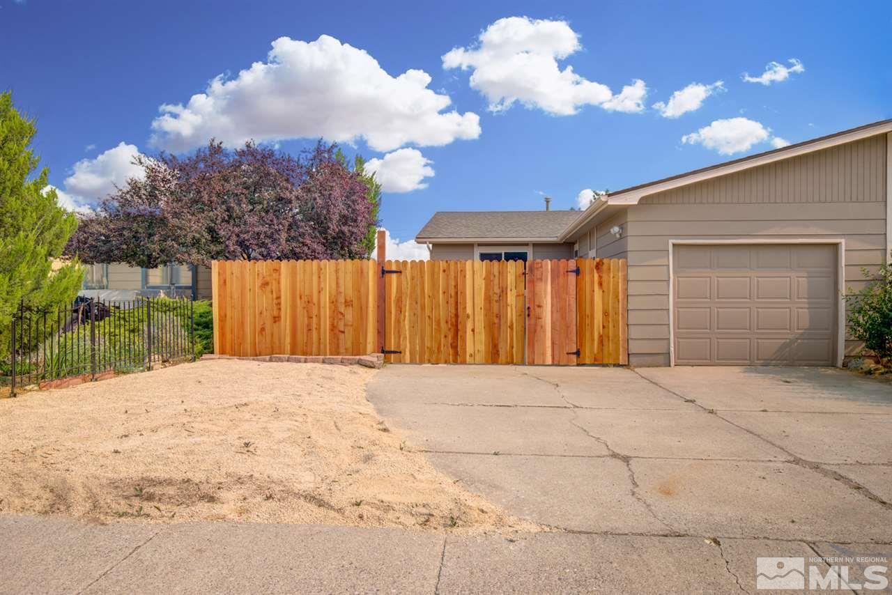 6755 Lotus Street Reno, NV 89506 - Photo 1 of 27 a view of backyard of a house