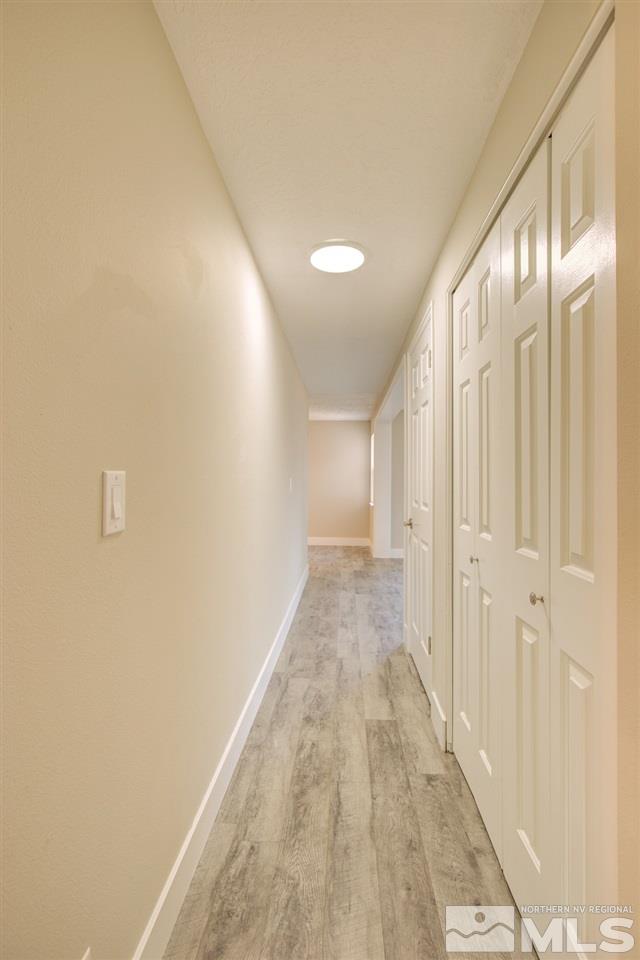 6755 Lotus Street Reno, NV 89506 - Photo 16 of 27 a view of a hallway